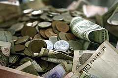 International Money Pile in Cash and Coins